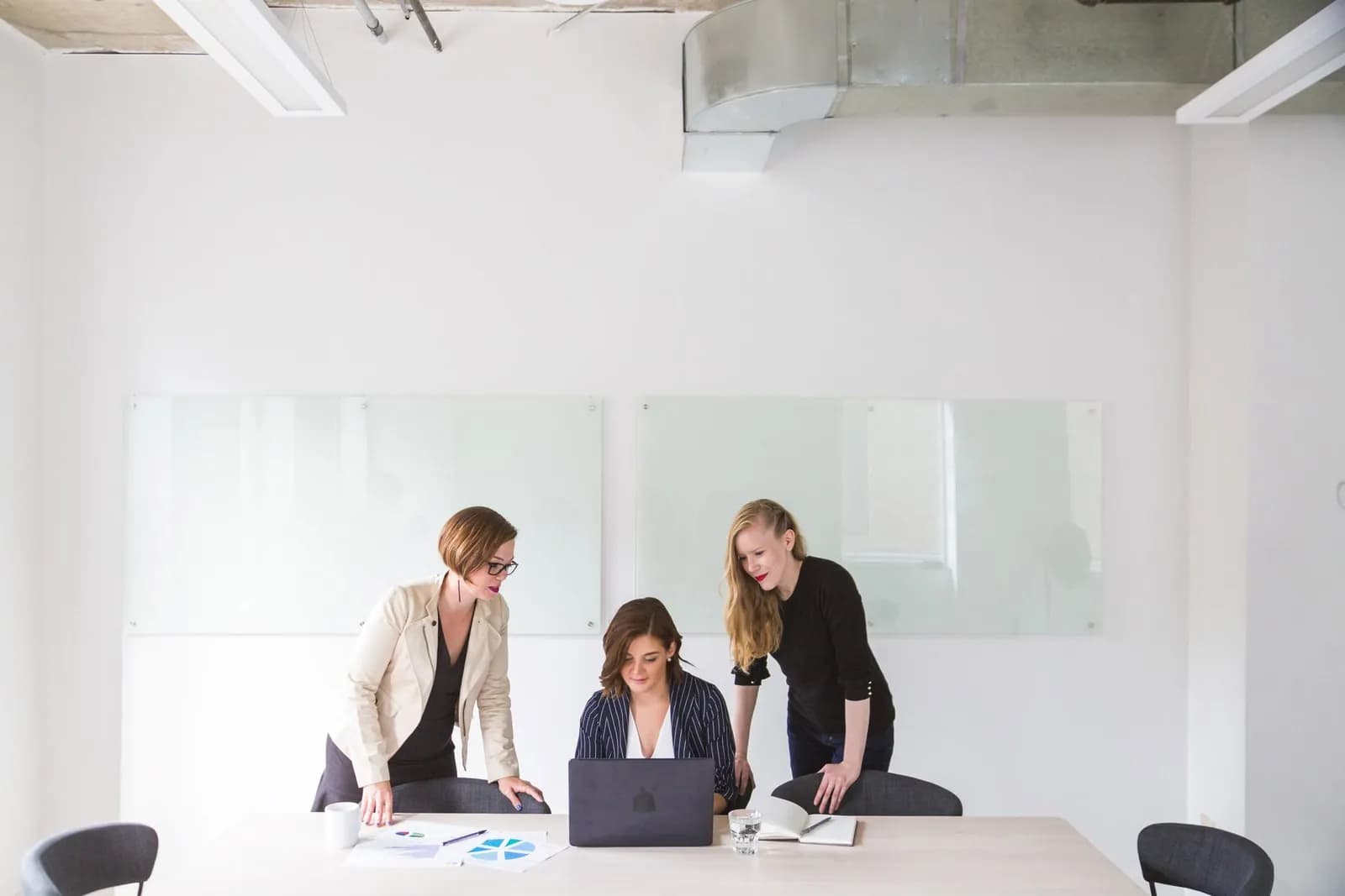 Lisora consultants collaborating in the office